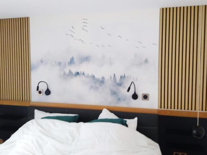 Pose d'un habillage mural pour un chalet dans Les Vosges